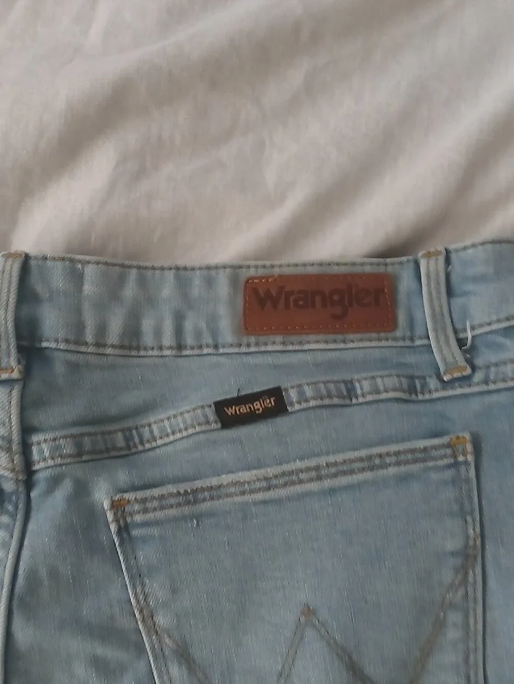 Wrangler Light Blue High-Rise Distressed Straight Leg Jeans